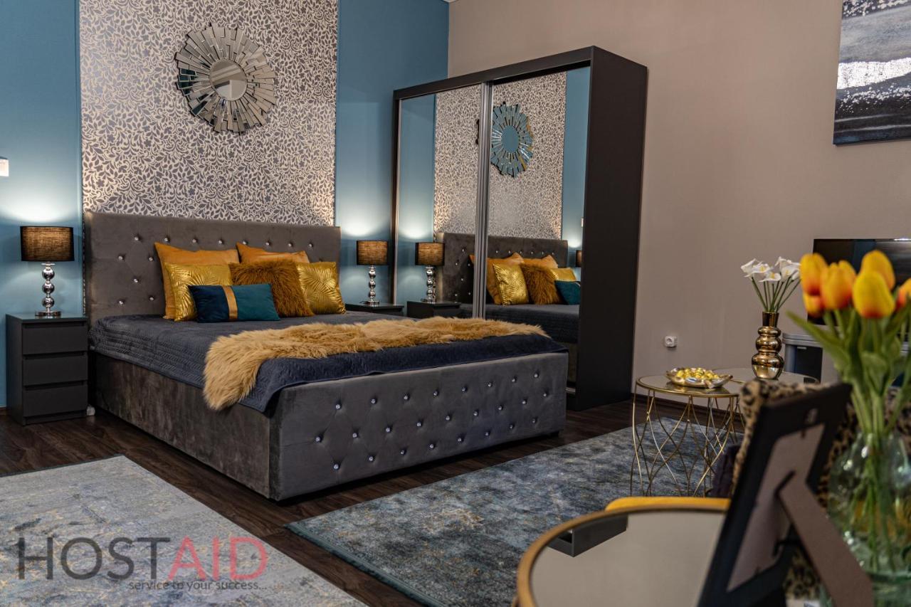 V68 Design - Hostaid Apartman